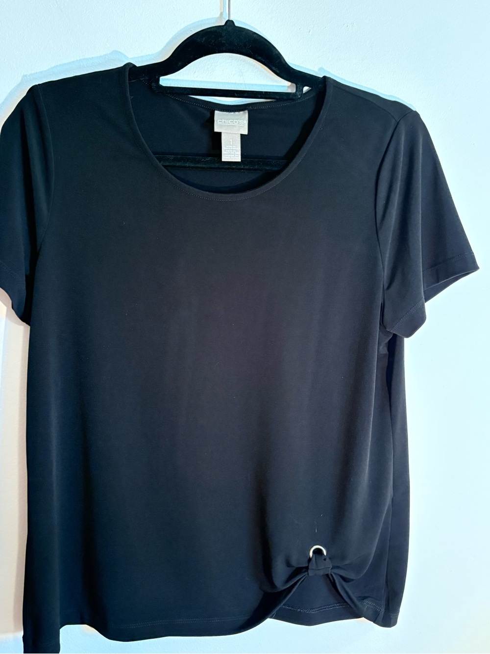 Chico’s Travelers Black Short Sleeve Top Size 1. Side Ring Detail Stretch Knit